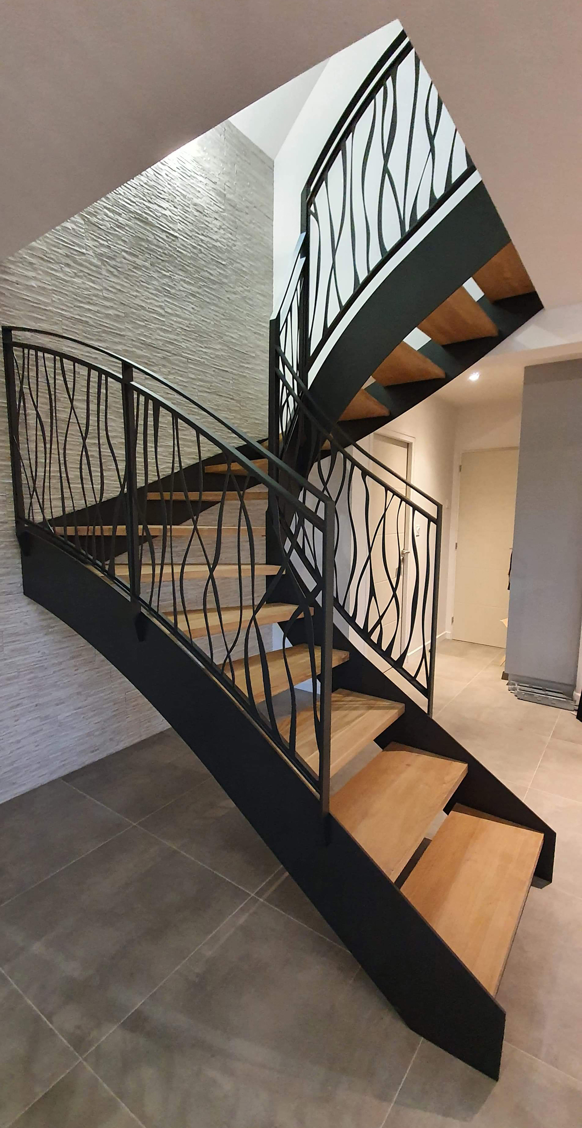 Installation d'un escalier avec rambarde métallique à Saint-Luce-sur-Loire